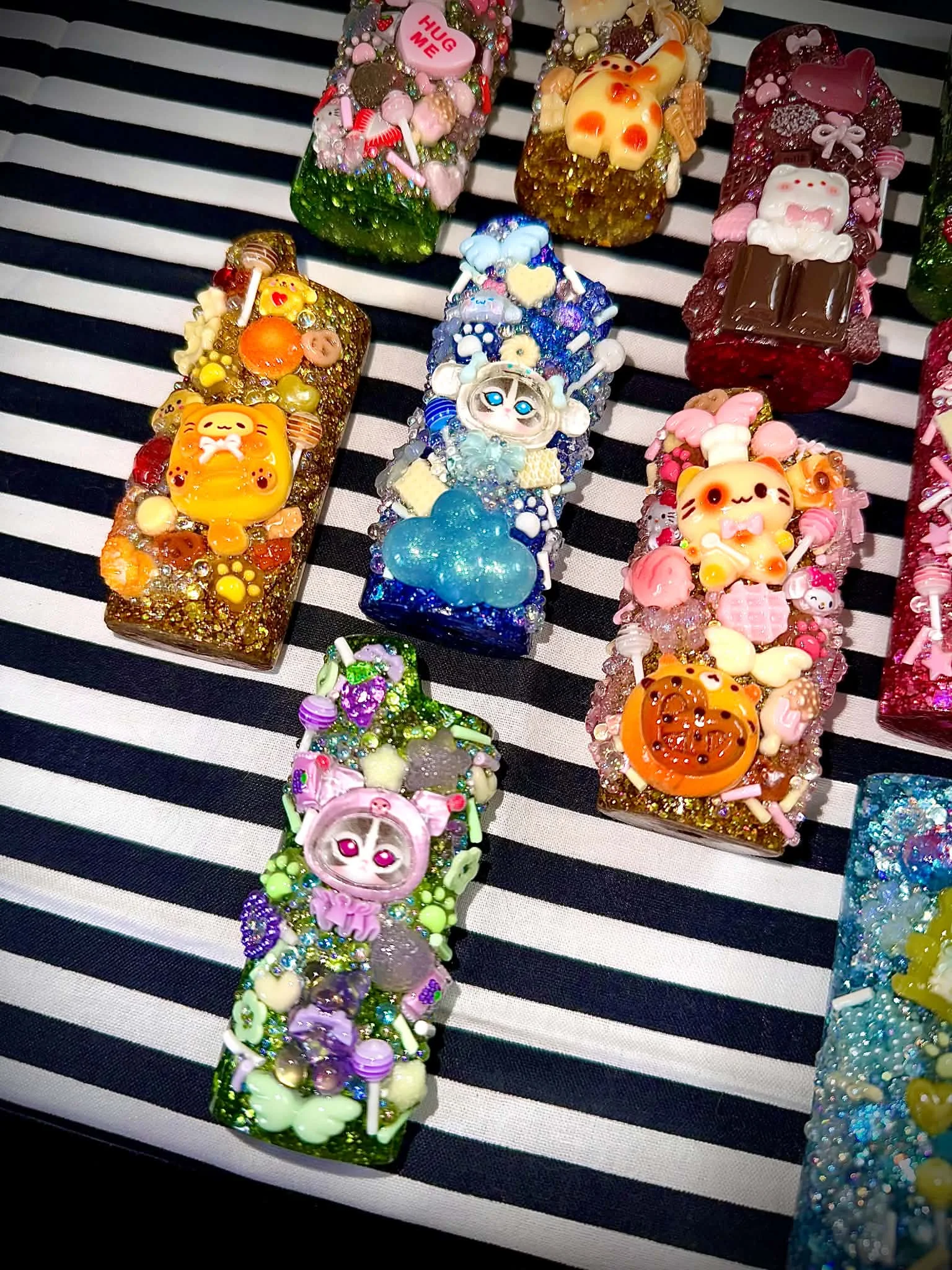 Close-up of colourful custom lighter cases